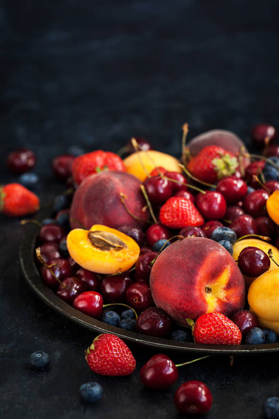 Fresh ripe summer berries and fruits  - Фото, зображення