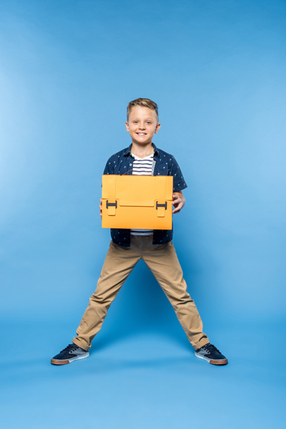 boy with paper briefcase - Фото, изображение