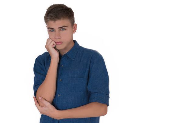 хлопчик-підліток у синій сорочці на білому тлі.ізольований об'єкт
 - Фото, зображення