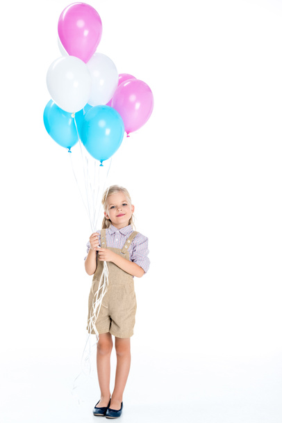 Enfant avec des ballons colorés
 - Photo, image