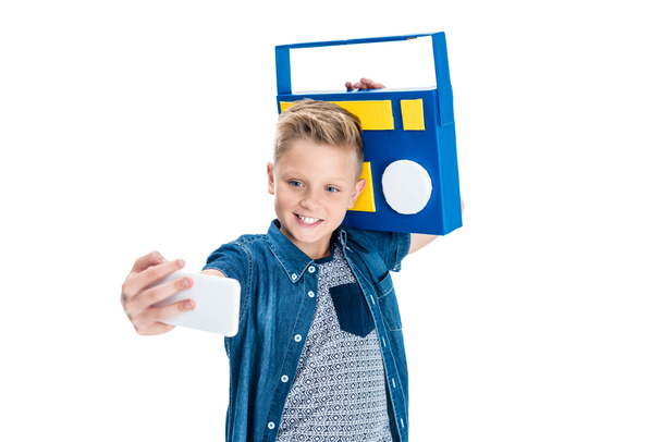 boy with tape recorder taking selfie - Zdjęcie, obraz