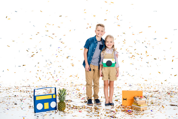 happy kids with confetti - Foto, afbeelding