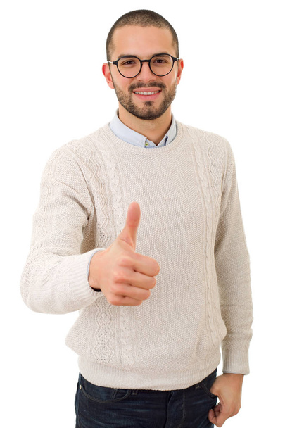 Young casual man going thumbs up, isolated - Photo, Image