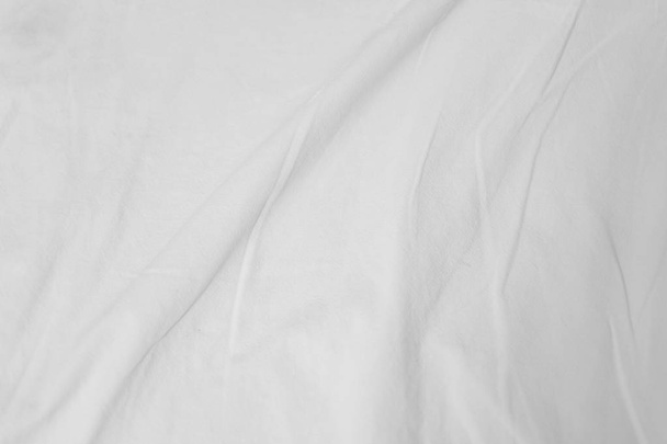 White delicate soft background of fabric or bedding sheet - Foto, imagen