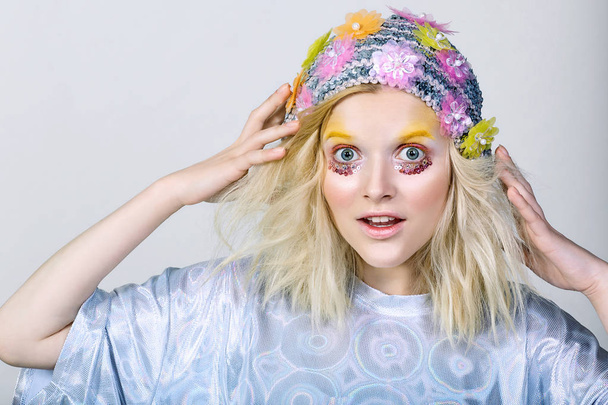 Young girl with colorfull makeup in sparkling hat - Fotografie, Obrázek
