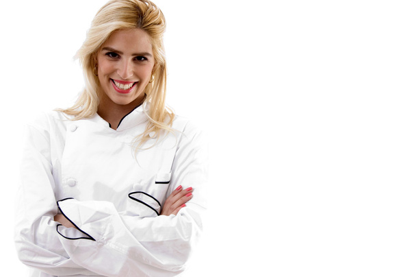 Female cook posing with her arms crossed - Foto, Bild