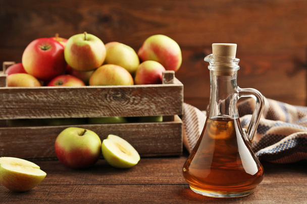 Apple vinegar in glass bottle  - Фото, зображення