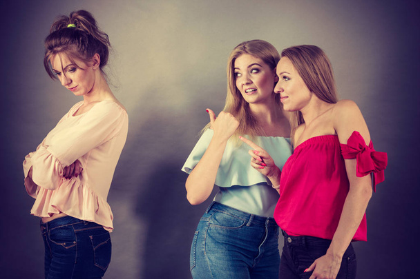 Woman being bullied by two females - Photo, Image