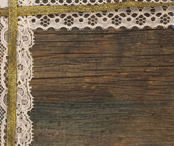 Rustic backgrund wit lace
 - Фото, изображение