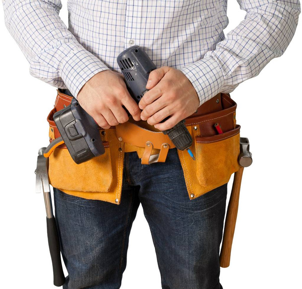 mannelijke werknemer houden elektrische boor - Foto, afbeelding