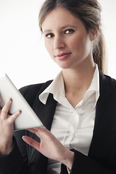 Business woman working on digital tablet - Фото, изображение