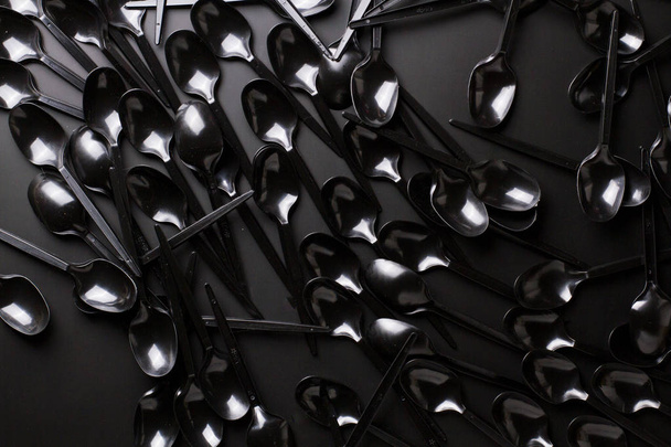  black plastic  spoons  - Photo, Image