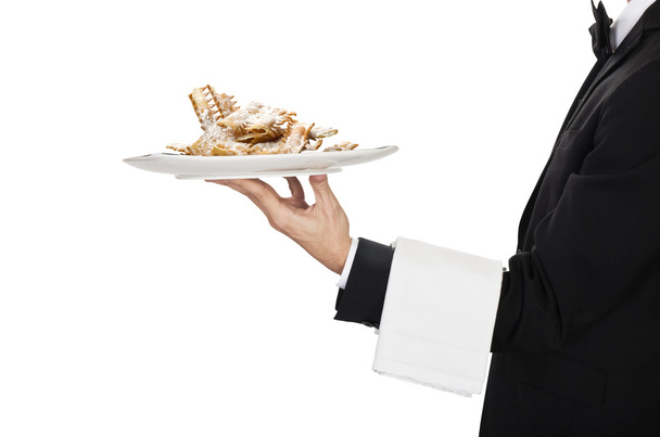 Waiter with carnival cake chiacchere - Fotografie, Obrázek