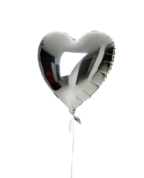 Single big  silver heart balloon object for birthday isolated - Fotoğraf, Görsel