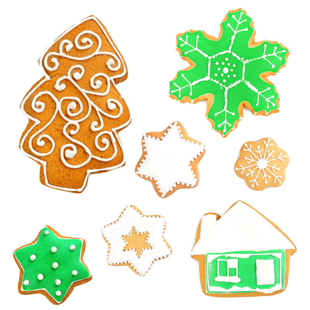 Delicious Christmas cookies on white background - Foto, Imagen