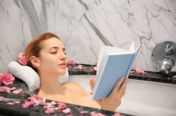 Young beautiful woman reading book  - Foto, Bild