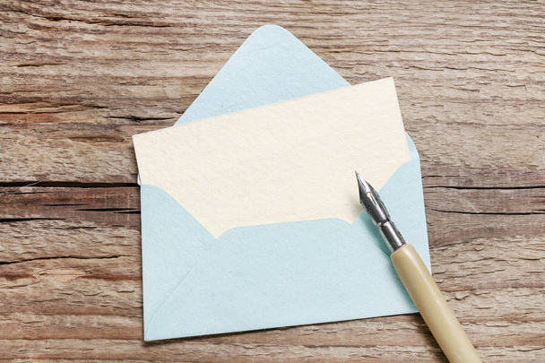 Open envelope and paper card inside - Fotoğraf, Görsel