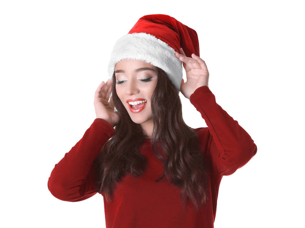 Pretty lady in Christmas hat - Foto, Imagen