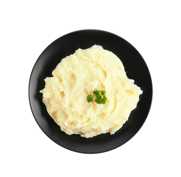 Black plate with mashed potatoes - Zdjęcie, obraz
