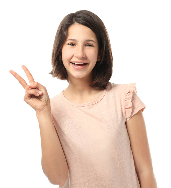 Pretty teenage girl posing on white background - Фото, зображення