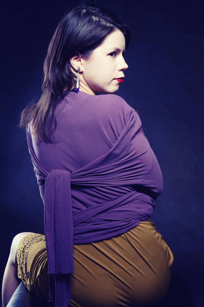 girl in purple straitjacket with bloody tears - Foto, imagen