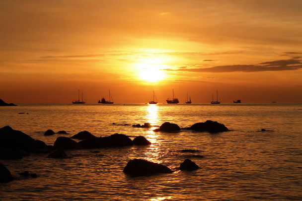 Golden sunset at beach island - Фото, изображение