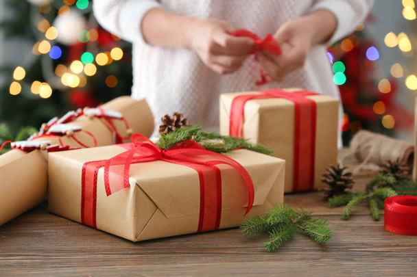 Christmas gift box and woman on background - Zdjęcie, obraz