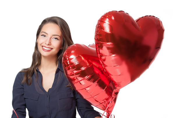 Cute brunette with heart ballons. - Photo, Image