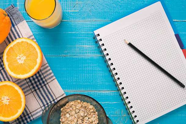 Oatmeal breakfast with orange juice - Photo, Image
