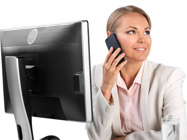 young businesswoman with computer and phone - Foto, Imagem