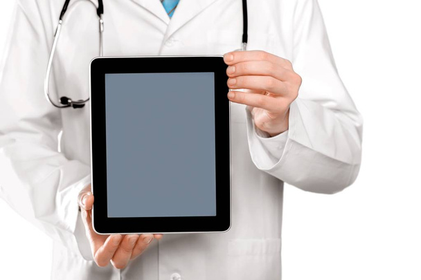 Doctor holding digital tablet - Фото, изображение