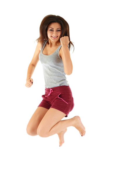 Young woman jumping - Fotografie, Obrázek