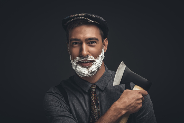 man shaving with axe - Fotoğraf, Görsel