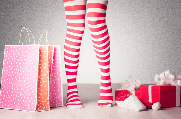 Sexy woman legs. Christmas concept - Фото, зображення