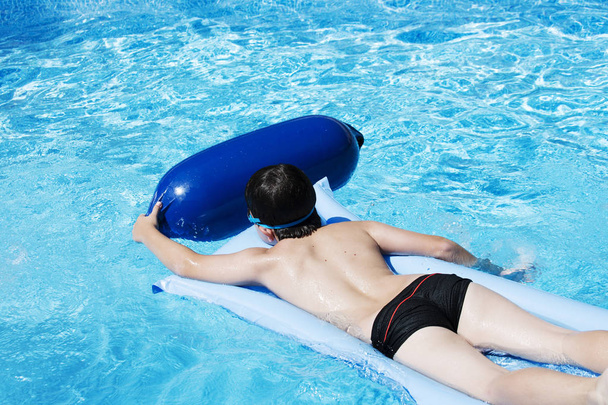 Activities on the pool, children swimming in water - Foto, imagen
