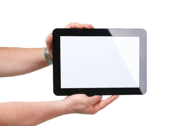 Man hoding black tablet frame in hand - Foto, afbeelding