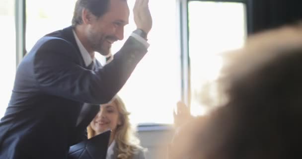 Leader Business Man Giving High Five His Businesspeople Team After Successful Brainstorming Meeting, Cheerful Boss Congradulating Colleagues - Filmmaterial, Video