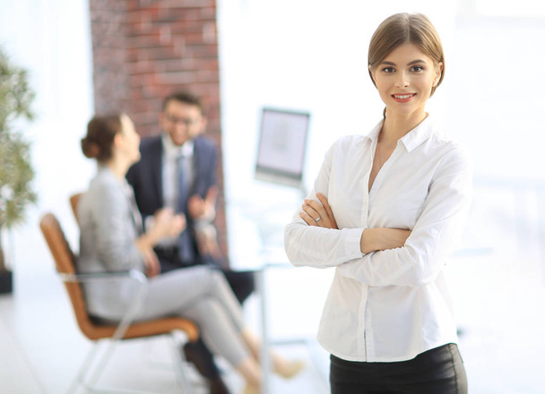 portrait of young business woman on the background of the office - Photo, Image