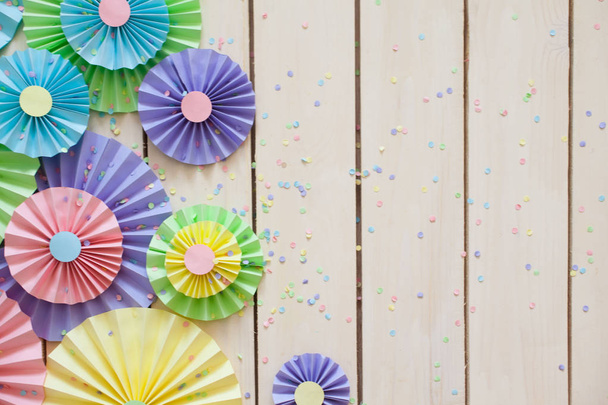 Colorful bright pastel paper rosette. Decorating for a party. - Zdjęcie, obraz