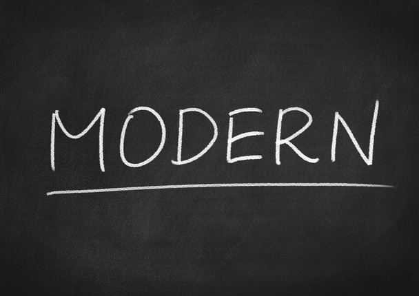 modern concept word on a blackboard background - Photo, Image