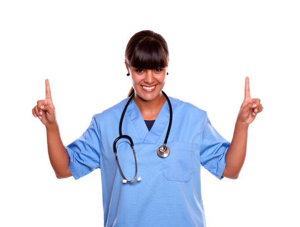 Charming medical doctor female pointing up - Fotografie, Obrázek