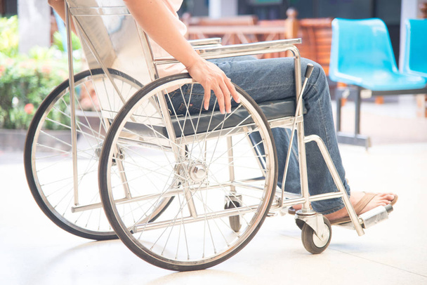Close up patient on a wheelchair. - Foto, Bild
