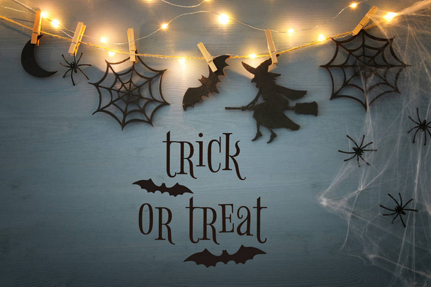 Halloween holiday concept top view scene over wooden background - Photo, Image