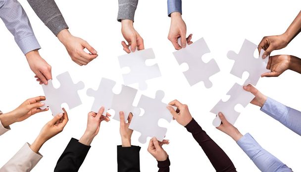 Hands Holding Jigsaw Puzzles - Photo, image