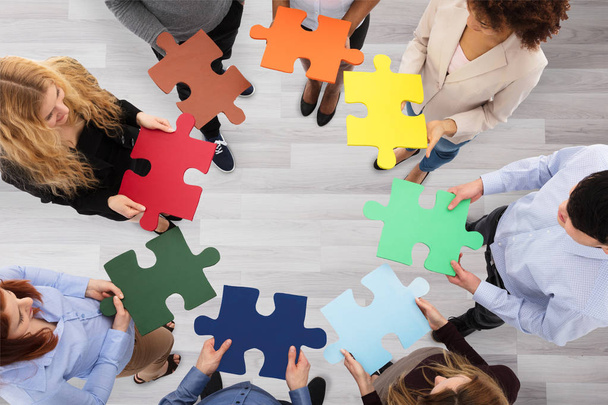 Group Of People Holding Puzzles - Photo, Image