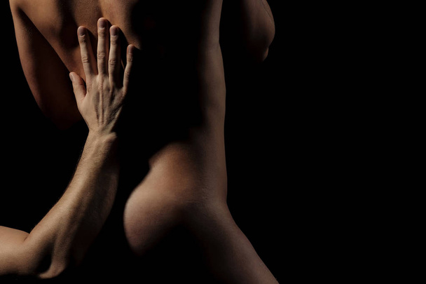 hand of man making massage on naked sexy woman - Фото, зображення