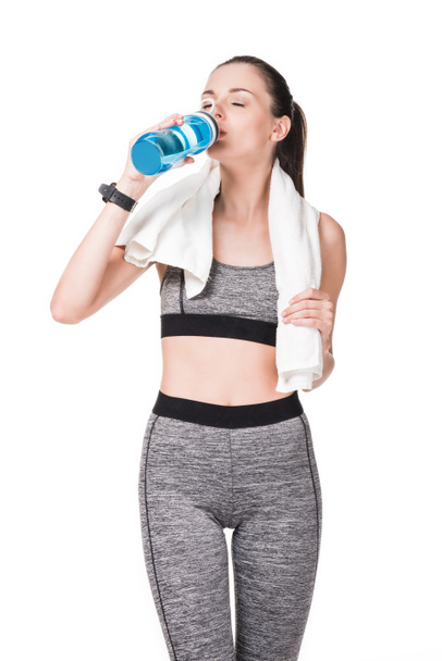 спортсменка з рушником і пляшкою води
 - Фото, зображення