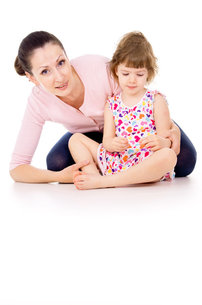 mother sits with little beautiful girl - Foto, Bild