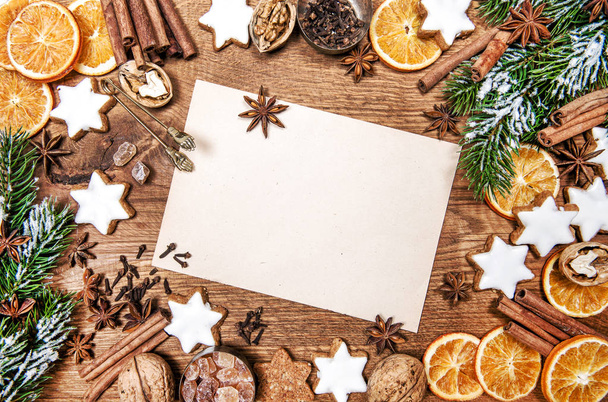Karácsonyi süti-fűszerek ünnepek élelmiszer-háttér - Fotó, kép