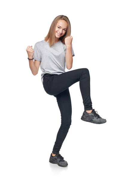 Teen girl showing thumb up sign - Fotografie, Obrázek